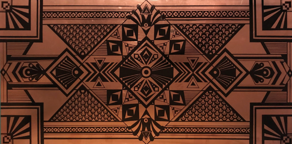 copper sheet with black ink design